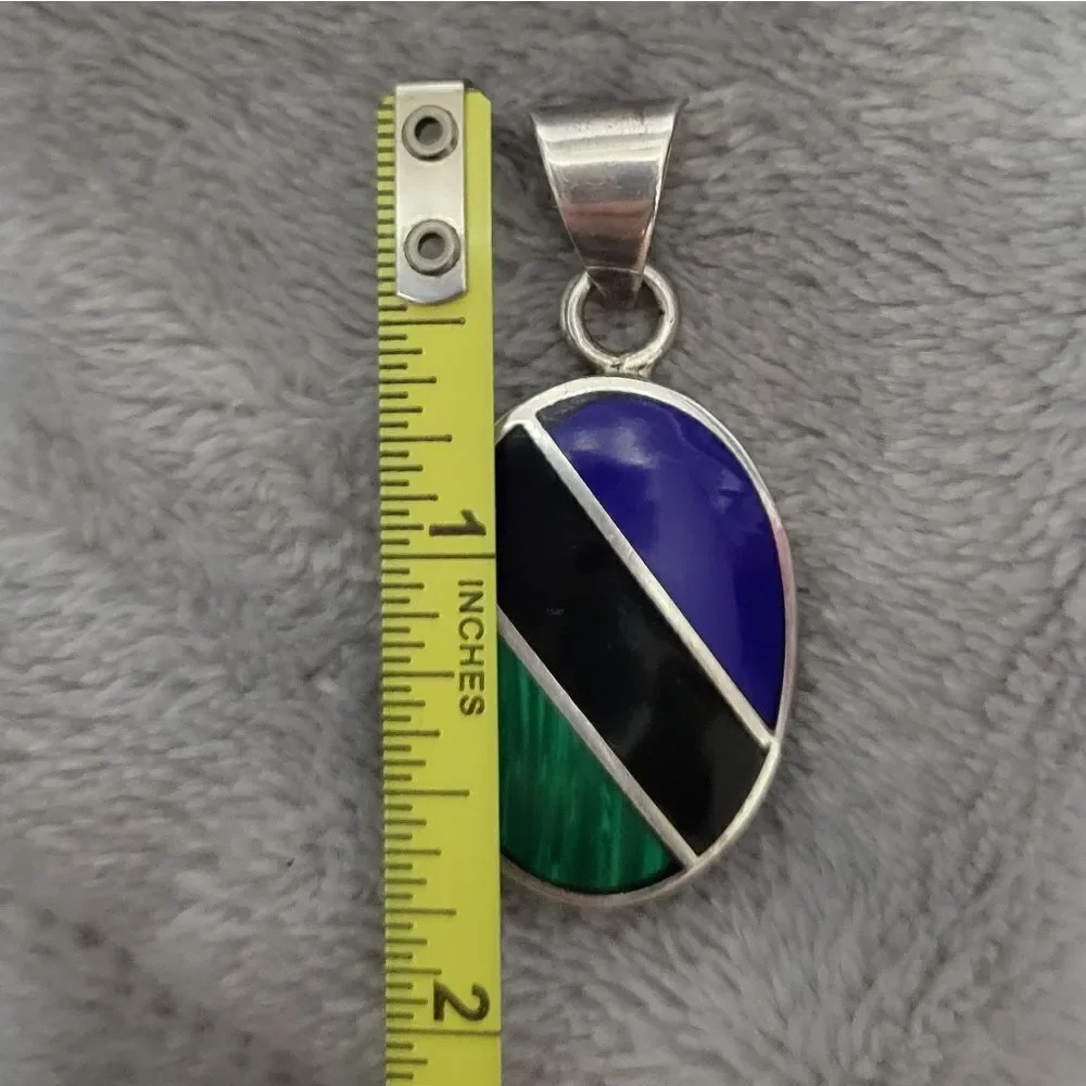 Green/black/blue silver pendant